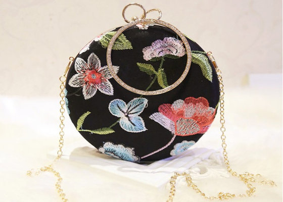 China Ladies Round Shape Black Embroidered Evening Bag With Crystal Handle supplier