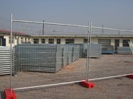 Metal temporary fence with stay and concrete bases portable movable