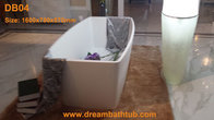 Freestanding corian bathtub