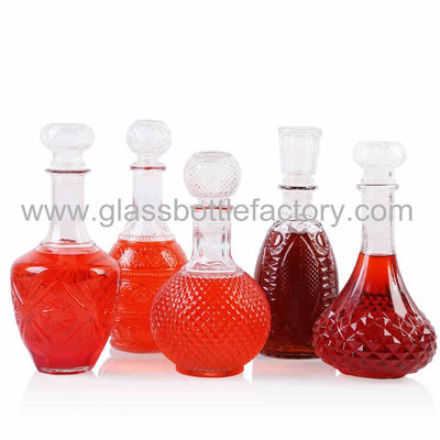 China 1000ml High Quality Clear Liquor Glass Bottle With Glass Cap supplier