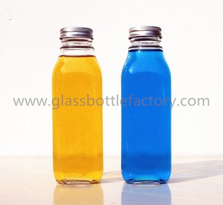 China 400ml Clear Square Glass Juice Bottles With Caps supplier