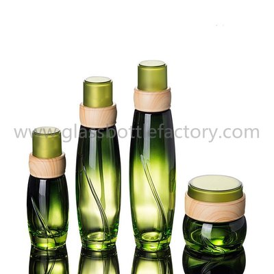 China 2017 Hot Items 40ml,100ml,120ml High Quality Glass Lotion Bottles And 50g Glass Cosmetic Jar With Wood Cap For Skincare supplier