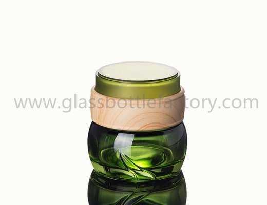 China 50g Hot Selling Green Glass Cosmetic Jar With Wood Lid supplier