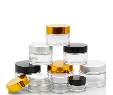 China 5g-100g Clear Round Glass Cosmetic Jars With Black Lids supplier