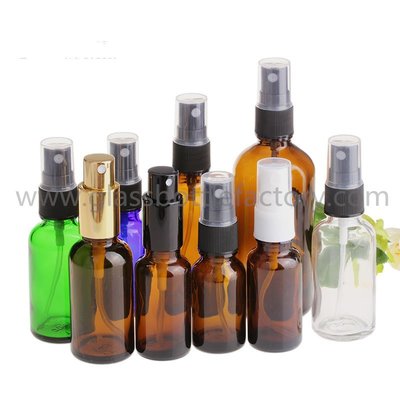 China Clear, Amber,Blue,Green Round Essential Oil Glass Bottles With Sprayer/Pump And Cap supplier