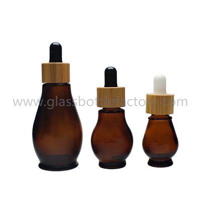 China Single Calabash Amber Essential Oil Glass Bottles With Bamboo Droppers supplier
