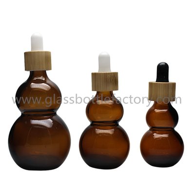 China New Model Double Calabash Amber Essential Oil Bottles With Bamboo Droppers supplier