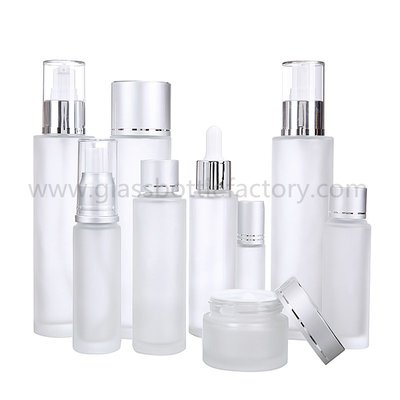 China 15ml-120ml Frost Cylinder Glass Lotion Bottles With Silver Pumps or Caps supplier