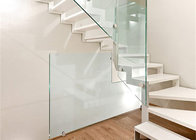 wooden tread staircase with tempered clear glass railing top handrail