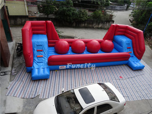 China Red Tarpaulin Inflatable Jumping Castle / Wipeout Obstacle Course 10x4m supplier