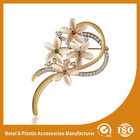 China Decorative Handmade Gold Brooches For Dresses With Crystal Stones distributor