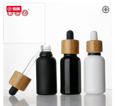 China 30ml CBD black frosted bottle and bamboo cap with gold print  and round box tube supplier