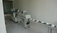 Fully Automatic single servo linear feed tableware packaging machine supplier