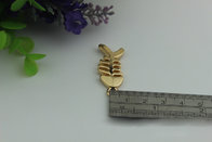 Small light gold fish bones pattern zinc alloy metal handbag logo label tags for sales