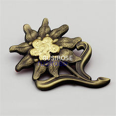 China Customized three-dimensional flower metal OEM, high-end furniture brand badges, edelweiss antique badge supplier