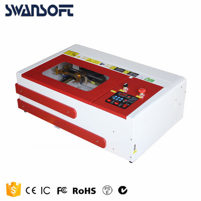 China SWANSOFT mini lazer engraver, small mini co2 40W laser rubber stamp engraving machine 3020 supplier