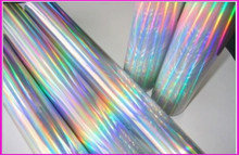 China Christmas Gift Rainbow Holographic Foil Silver Foiling 12Micron Thickness supplier