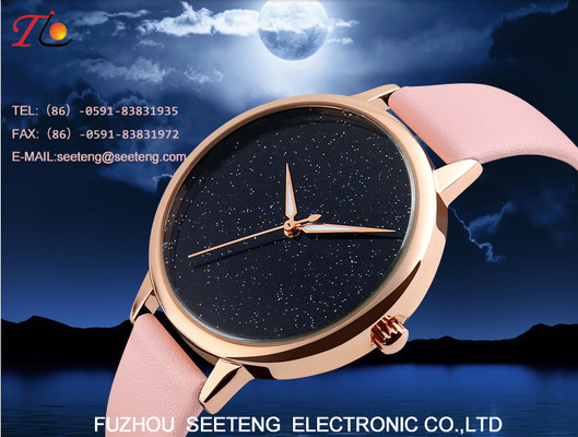 China Simple and clean starry sky dial golden alloy case lady watch with colorful pu leather strap supplier