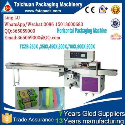 Horizontal packaging machine for sponge , scourer, foam, baorbent cloth