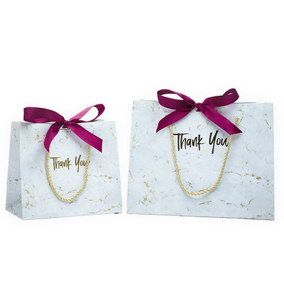 China Ivory paper customised marble paper bag stone design candy bags handmade rope handle supplier
