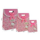 Top folded design hello kitty paper material gift bags with die cut handle welcome custom full color printing